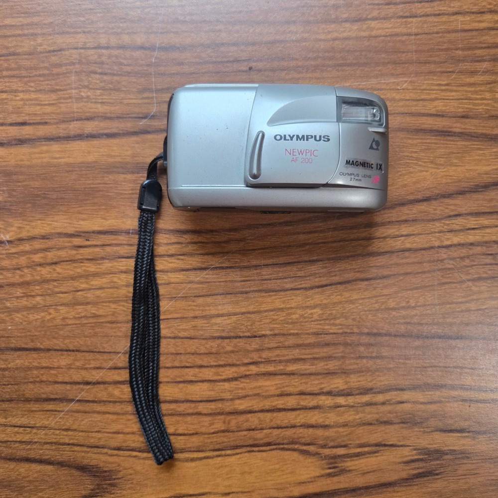 Olympus Newpic AF 200 APS Film Camera Silver 27mm Lens Quartzdate Untested